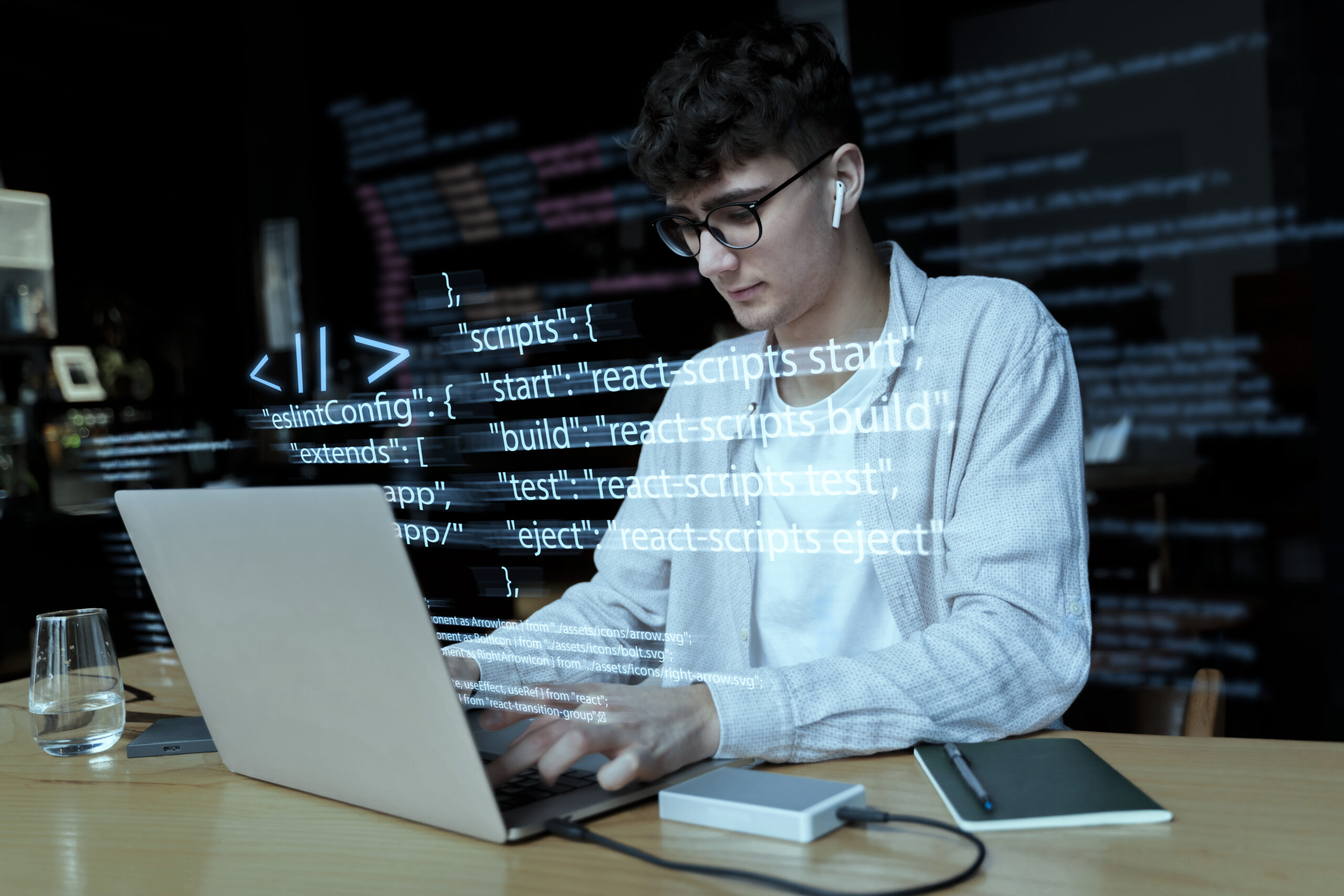 programming background with person working with codes computer 1 scaled.jpg